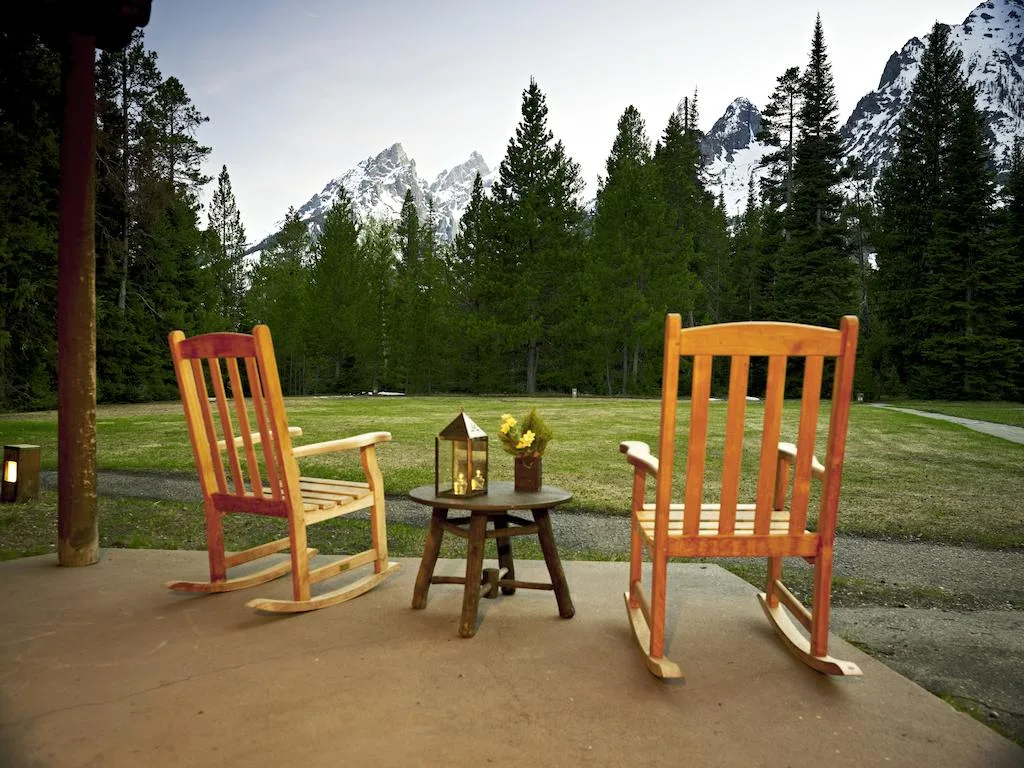 Rocking chairs and the Teton range at a Jackson Hole lodge for an executive retreat