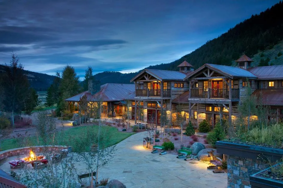 Ranch lodge at dusk in Montana for an executive retreat and offsite