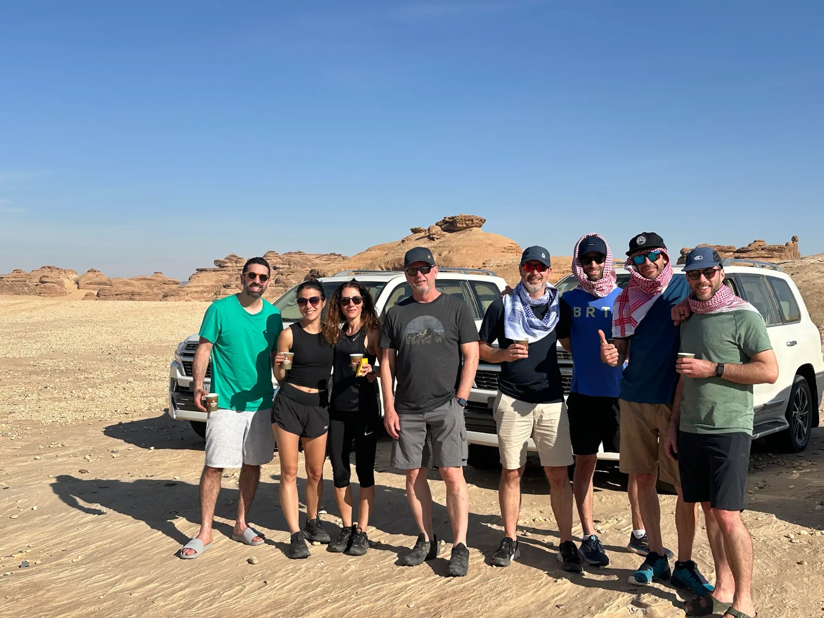 An executive team together in the desert during a retreat