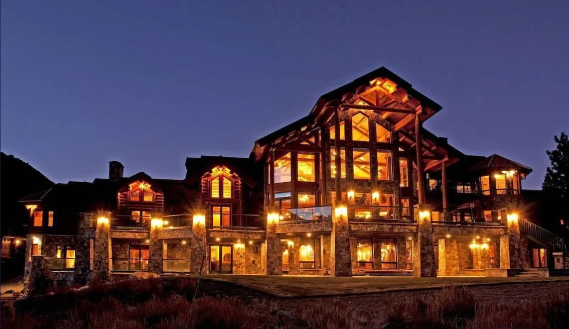 A five-star mountain lodge hosting an executive leadership retreat in the Sierra Nevada